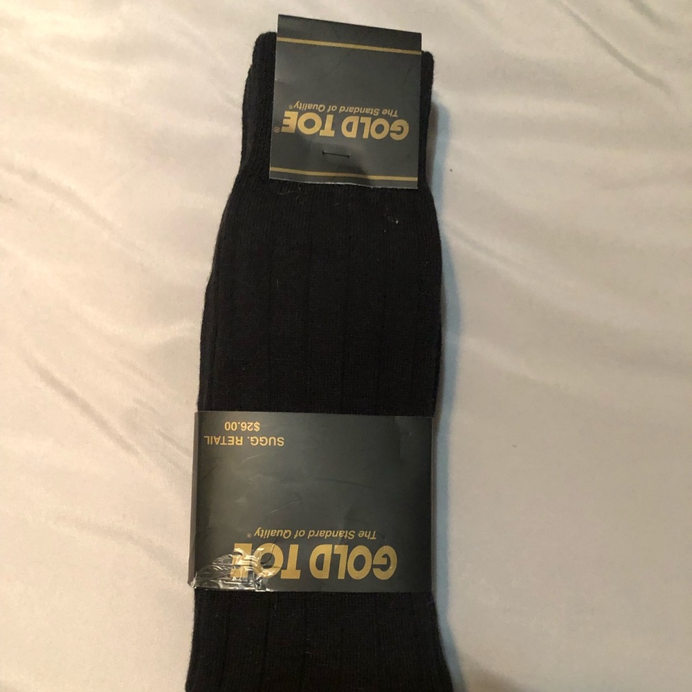 three pair gold toe socks